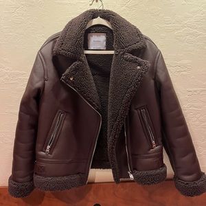 Brown Leather/Teddy Jacket from Bershka.